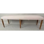 HALL SEAT, Victorian style, six reeded supports, neutral upholstery, 151cm x 40cm x 49cm.