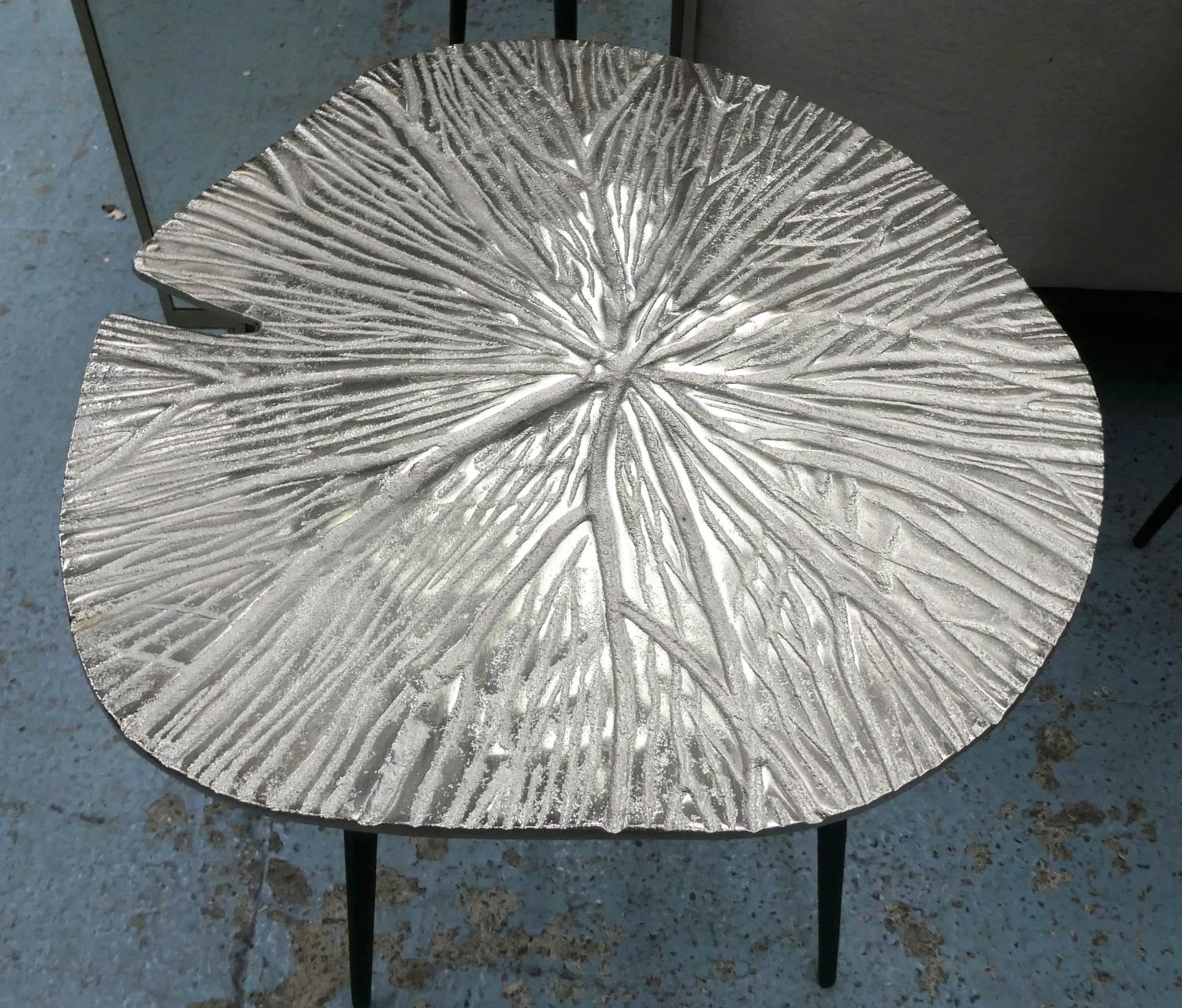 LILY PAD SIDE TABLES, a pair, graduated pair, 49cm x 53cm x 54cm at largest, polished metal tops. ( - Image 2 of 3