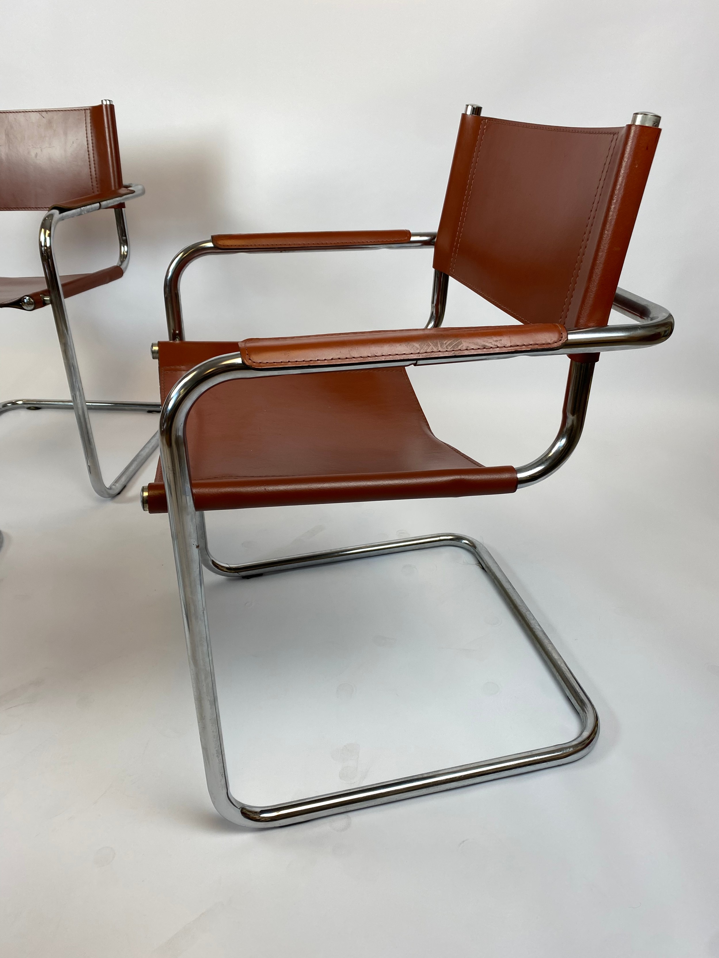 DINING ARMCHAIRS, a set of four, tan leather and cantilever chrome framed, after a design by Mart - Image 4 of 4