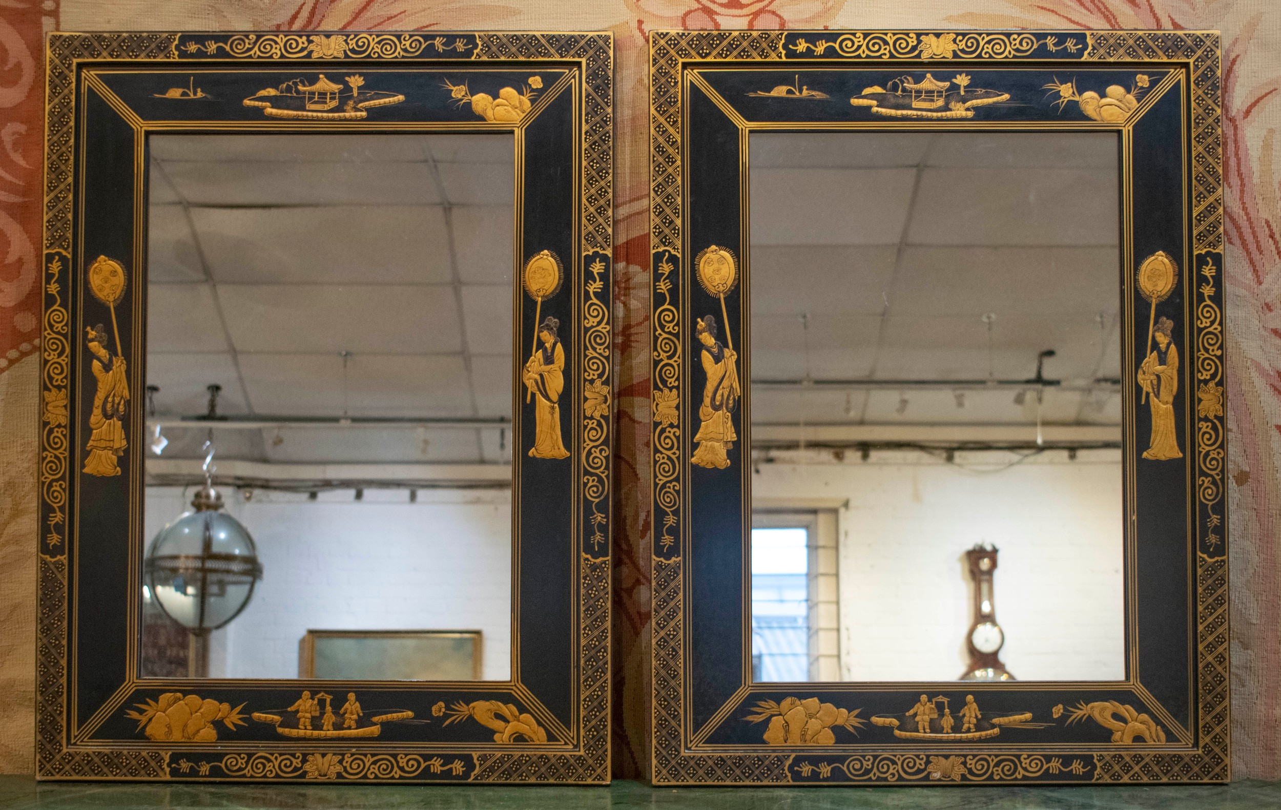 WALL MIRRORS, a pair, black and gilt Chinoiserie decorated, 66cm x 89cm H. (2)