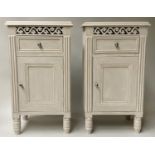 BEDSIDE CHESTS, a pair, French style, traditionally grey painted and pierced, each with drawer and