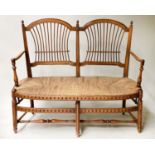 HALL BENCH, late 19th century walnut, with twin arched spindle back and rush seat, probably