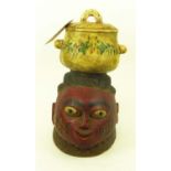 YORUBA GELEDE MASK, Nigeria, carved wood, painted finish (red, yellow), with cooking pot with floral