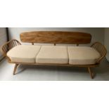 ERCOL 'SURFBOARD' SOFA, 205cm W, elm and beech slatted with seat cushions and surfboard back.