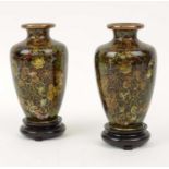 CLOISONNE MINIATURE VASES, a pair, 13cm H, foliate patterned, on wooden stands, and two cloisonné