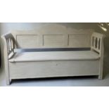 SWEDISH SETTLE, 19th century, traditionally grey painted with rising seat, 183cm W.