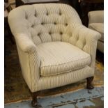 ARMCHAIR, 79cm H x 77cm ticking upholstered with cushion seat and rear brass castors.