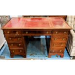 PEDESTAL DESK, 122cm x 58cm x 78cm H, early 20th century mahogany, the inlaid tooled red leather top