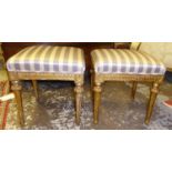 STOOLS, a pair, 41cm x 44cm H x 38cm, 19th century giltwood framed with striped upholstery on fluted