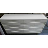 CHEST OF DRAWERS, 148cm x 41cm x 87cm, contemporary wave design, white lacquered finish.