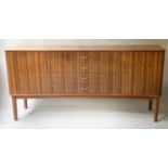 GORDON RUSSELL STANWAY SIDEBOARD, 1960 teak and Indian Laurel, concave with four drawers flanked