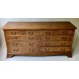 LOW CHEST, George III style burr yewwood with nine drawers, 153cm x 48cm x 73cm H.