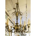 CHANDELIER, 78cm W x 100cm H, gilt and patinated metal with six lights and glass drops