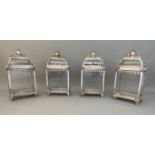 STORM LANTERNS, a set of four, 50cm x 26cm x 14cm, Regency style. (4)