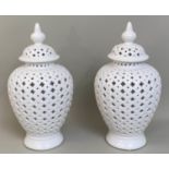 PIERCED TEMPLE JARS, a pair, 50cm x 25cm, white glazed ceramic. (2)