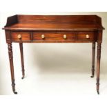 WRITING TABLE, Regency period mahogany and ebony inlaid, galleried and bowed with three drawers,