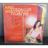 AMY WINEHOUSE, signed 'Stronger than me' record, autographed and dedicated "Lots of love Amy",