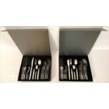 CUTLERY SETS , a pair, 23cm x 23cm each, 16 pieces, boxed. (2)