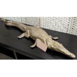 CONTEMPORARY SCHOOL SCULPTURAL CROCODILE, 130cm L, gilt finish.