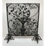 FIRE GUARD, attributed to Charles Hancock of Cheltenham c. 1880, decorative cast iron scroll, vase