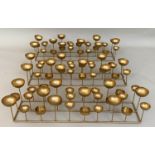 TABLE CANDELABRAS, a set of three, 56cm L each, gilt metal. (3)