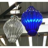 CEILING LIGHTS, two, one clear and another blue tinted glass, 104cm drop at largest. (2)