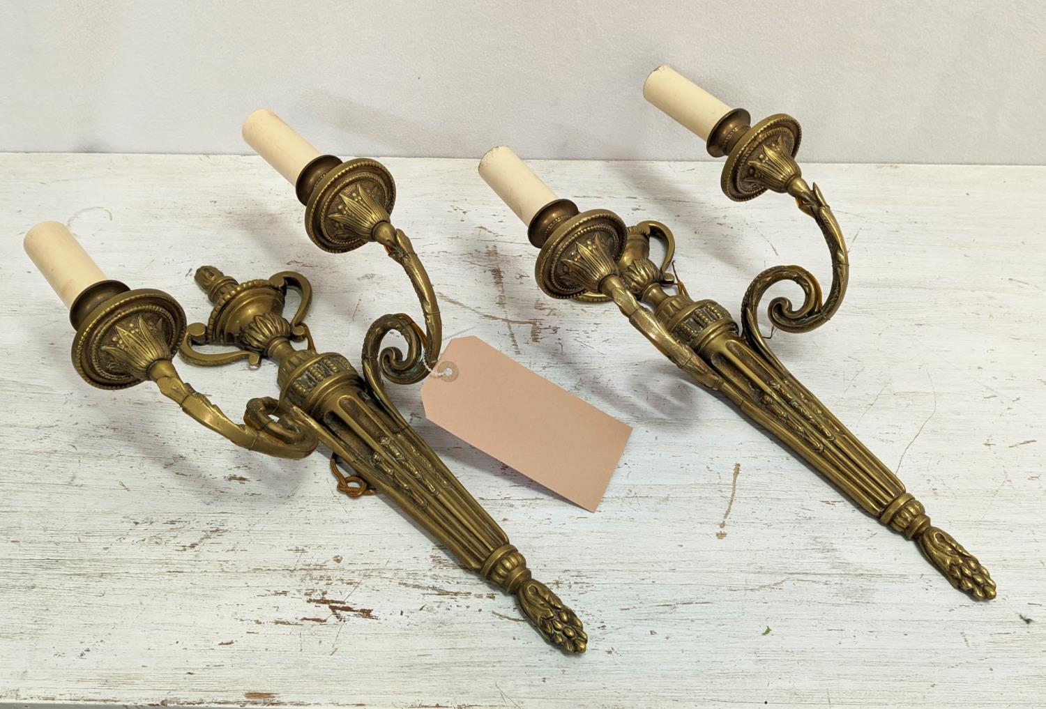 WALL SCONCES, a pair, 43cm L, two branch, gilt metal. (2)