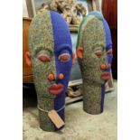 LARGE IFE BEADED HEADS, a pair, of terracotta base, Nigeria, 93cm x 32cm tallest and 88cm x 32cm. (