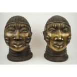 BRONZE BENIN IFE HEADS, a pair, of the Yoruba people of Nigeria, 33cm x 20cm. (2)