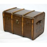 TRAVELING TRUNK, early 20th century, canvas with two interior trays and leather handles.