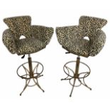 BAR STOOLS, a pair, 107cm x 61cm, 90cm, painted Rococo style, upholstered in cheetah print fabric,