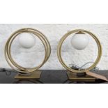 TABLE LAMPS, 33cm H, gilt metal, orb lights. (2)