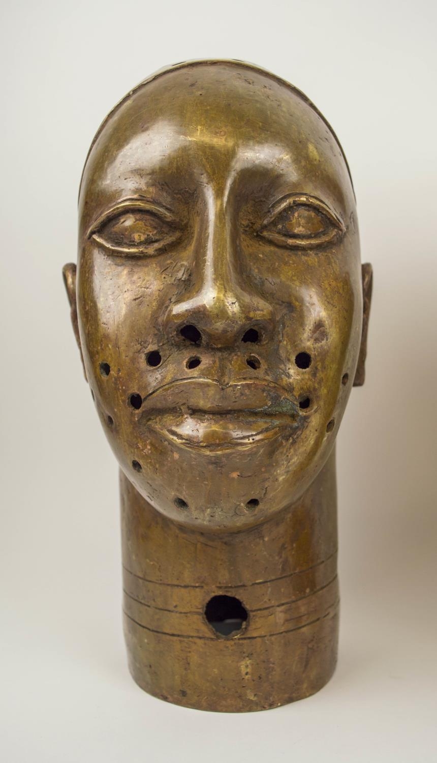BRONZE BENIN KING OBA HEADS, a pair, of the Yoruba people of Nigeria, 34cm x 18cm. (2) - Image 2 of 5