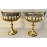 OVERSIZED FLOOR URNS, a pair, 77cm x 65cm diam., gilt metal. (2)