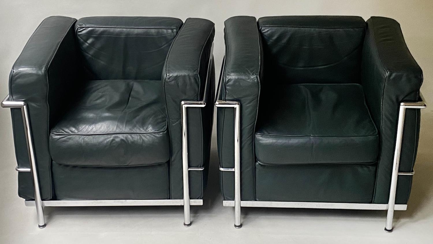 AFTER LE CORBUSIER LC2 STYLE ARMCHAIRS, a pair, 75cm W. (2)