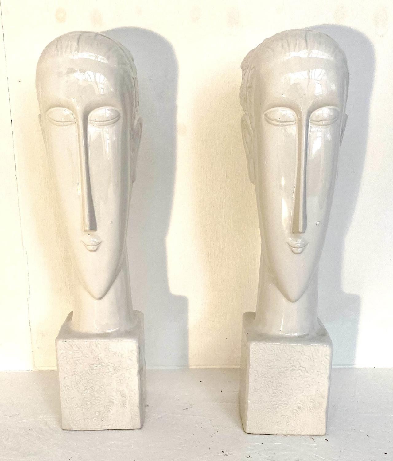 CONTEMPORARY SCHOOL SCULPTURAL BUSTS, a pair, 60cm H, ceramic. (2)