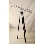 TELESCOPE ON STAND, polished metal, 193cm at tallest.