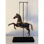 CONTEMPORARY SCHOOL SCULPTURE CAROUSEL HORSE, 90cm H, suspended from stand.