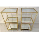 ETAGERES, a pair, 81cm x 41cm x 31cm, 1960's French style, gilt metal and glass. (2)