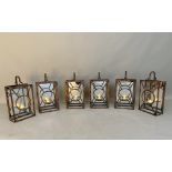 WALL HANGING CANDLE LANTERNS, a set of six, 33cm x 22cm x 11cm. (6)