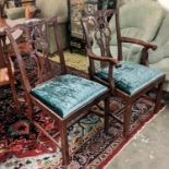 DINING CHAIRS, a set of ten, Chippendale style mahogany with stain drop in seats. (10)