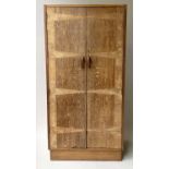 HEALS WARDROBE, Art Deco period oak and radial oak with two panel doors enclosing divided hanging