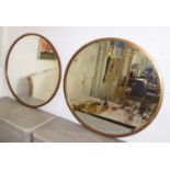 WALL MIRRORS, a pair, 80cm diam, circular gold coloured metal. (2)