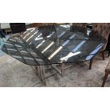 DINING TABLE, 184cm diam x 72cm H, contemporary, polished metal base, smoked glass top.