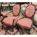 ARMCHAIRS, his and hers, Victorian walnut with patterned buttoned back upholstery. (2)