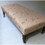HEARTH STOOL, Regency style rectangular tapestry brocade with turned supports, 145cm x 63cm x 43cm