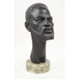 A GIANELLI SCULPTURE, 36cm H, Italian mid century, African man on circular barble base.