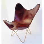 AFTER BONET KURCHAN AND FERRARI HARBOY BUTTERFLY CHAIR, 94cm x 75cm x 70cm.