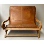 SEAT, ranch style in studded and laced natural hide leather with scroll arms, 118cm W.