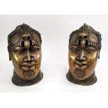 BENIN OBA HEADS, a pair, 33cm H, bronze. (2)